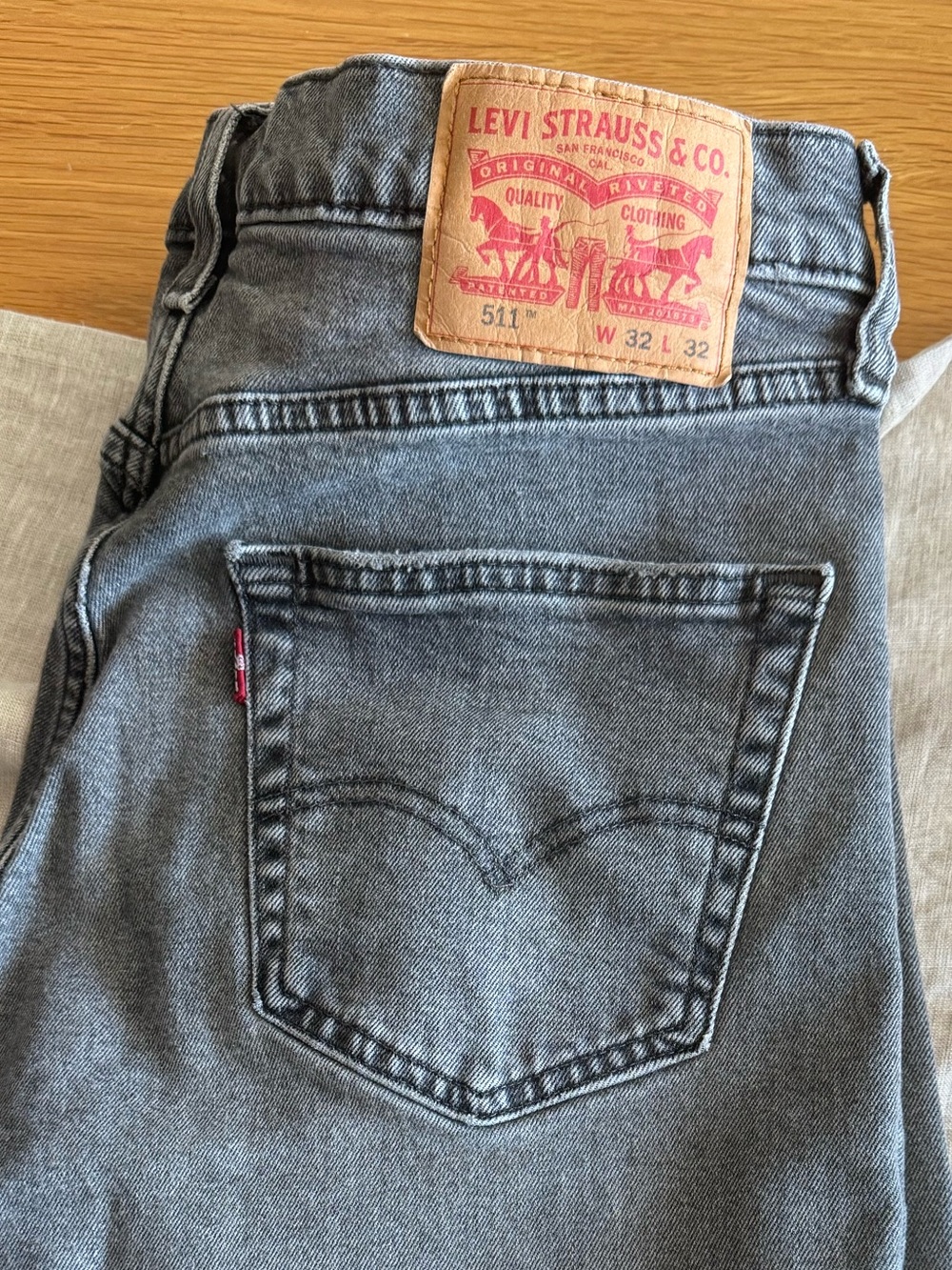 Levi's gray denim jeans with interior care tags